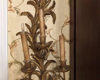 One of a pair of French antique 3-light  gilt wood wall sconces.
