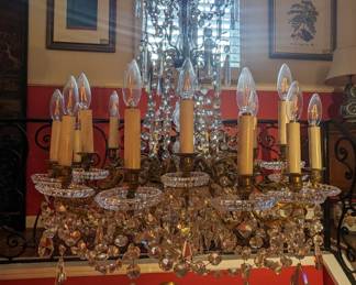 Unlit shot of the antique Baccarat 18-light crystal chandelier. 