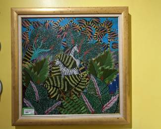 Nicely framed original oil on board Haitian jungle art, pair of hand-painted Italian porcelain bowls and cast iron bunny head wall hook. 