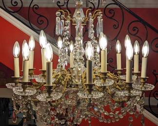 Stunning entryway antique French Baccarat 18-light crystal chandelier. This image is lit, the next image in unlit. 