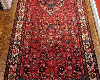 Hand-woven Persian Baghtuyaar runner, measuring 10' 5" x 3' 5".