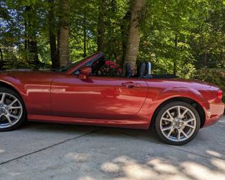 2014 Mazda MX-5 Grand Touring edition, with a whopping 12,274 original miles.                                                                                                           This is perfect timing to acquire this fun thing, as the beautiful weather in Atlanta is about to begin. You can be your own Barbie (or Ken!) tooling around town, looking cool and disassociated. $19,995.00