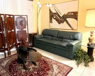 Green Leather couch, Japanese wood, folding screen, Lee Reynolds Painting, Postmodern glass top coffee table