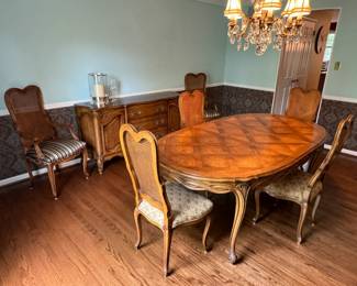 Drexel dining table and cane-back chairs with Karges buffet