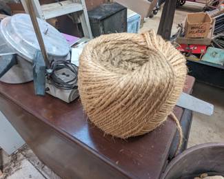 aluminum cookware, large ball of twine...