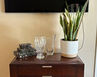 Samsung flat screen tv, century dresser, vases, plant