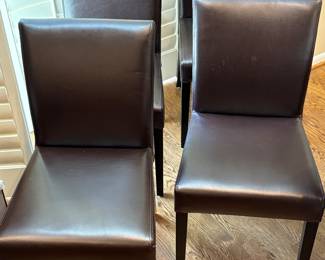 Set of brown leather chairs