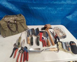 assorted garden tools and bag