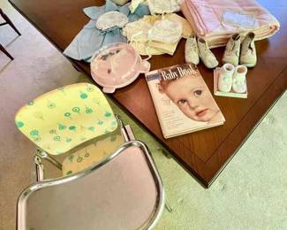 Lot 143-LR: Vintage Baby Items

Features: 
•	Book, blanket, caps, shoes, clothes, highchair, and plate
•	Please see photos for more detail


Condition: Varies – Fair to Good pre-owned condition
