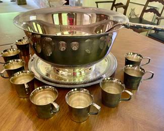 Lot 049-LR: Webster Wilcox Silver Plate Punchbowl & Cups

Features: 
•	Punch bowl and ladle, platter, and 10 cups

Condition: Good pre-owned condition

