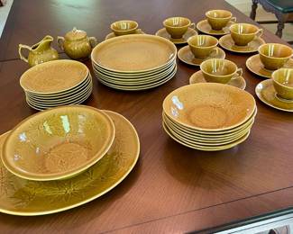 Lot 033-LR: WoodSong Pottery 8-piece Place Setting

Features: 
•	Honey-brown pottery place settings for 8 by WoodSong
•	8 dinner plates, 8 salad plates, 8 bowls, 8 cups & saucers, 1 serving bowl, 1 platter


Condition: Very good pre-owned condition. No chips or cracks observed.

