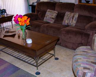 Upholstered couch, beautiful wooden coffee table
