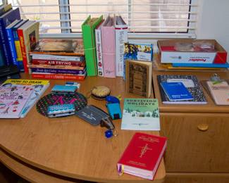 Assortment of books and office supplies