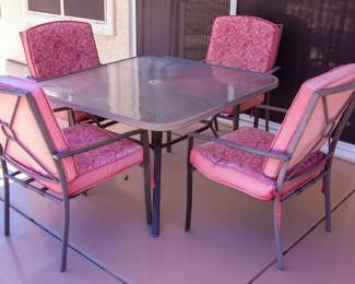 Glass top outdoor table and chairs (x4)