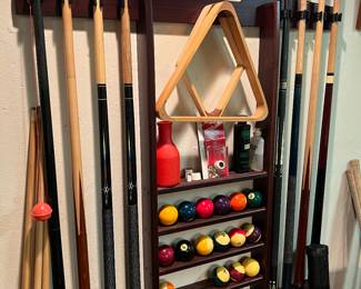 Billiard rack, cues, and cue balls