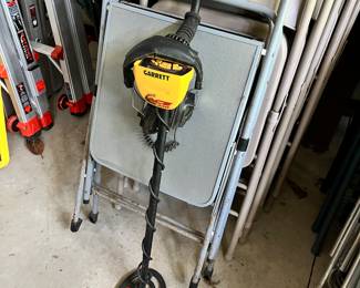 Metal detector and metal folding chairs