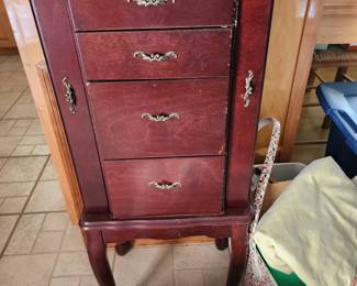 One of 2 stand alone jewelry cabinets