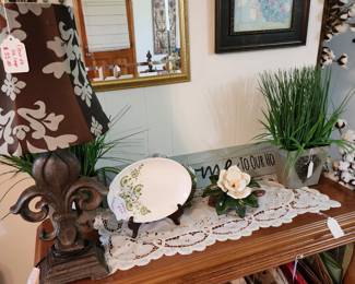 One of two console tables, fleur de lis lamp