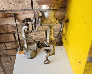 Old meat grinders - one very large