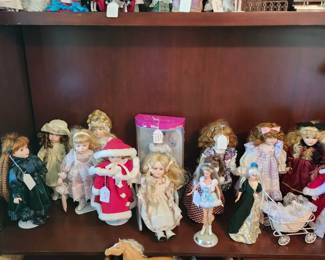 Collection of dolls  - Barbies, porcelain dolls and other toys.  We also have lots of Barbie clothes and shoes
