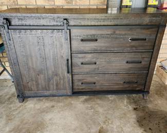 Beautiful sideboard/buffet has barn door closure