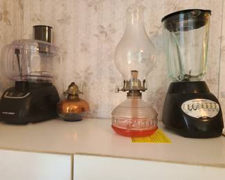 Rarely used blender and food processor. Many oil lamps!