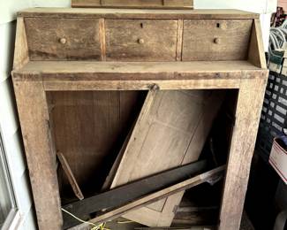 This is a beautiful old primitive piece.  The doors are inside it and there's a coin tray on top.