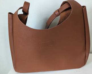 Neiman Marcus brown tote , barely used, excellent condition.
