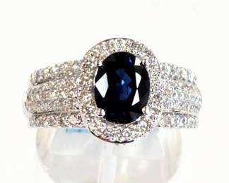 Blue sapphire and Diamond ring in 14k white gold size 7 (sizing available)