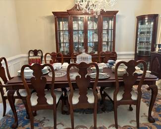 Gorgeous dining table, 10 chairs, extra leaf, and table pad. Several sets of China, beautiful China cabinet, curio cabinet, buffet table, large area rug