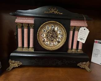 Mantel Clock with Columns and Lion's Heads