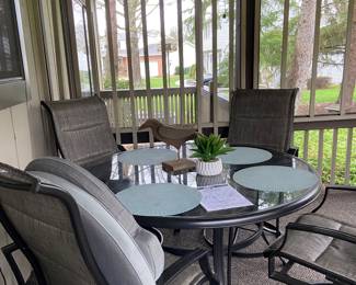 Great patio table with four chairs - as good as brand new