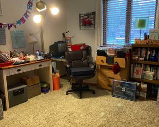 Room full of office supplies, books, and lots of misc “fun” stuff ….:check out that three arm ARC lamp 
