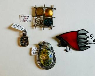 Brooches, including Sydney Lynch (top) and Avi Soffer (bottom)