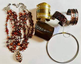 Copper and mixed metal cuff bracelets (upper R) and David Yurman sterling and 18K choker (lower R)