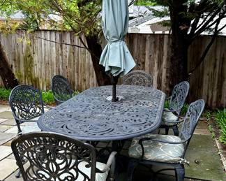 Hanamint cast  aluminum oval table and six chairs