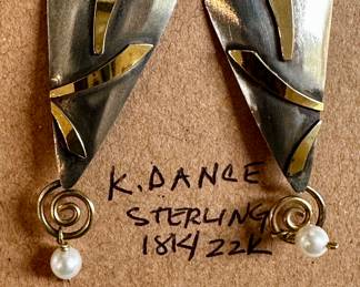 Mixed metal pierced earrings, signed K. Dance