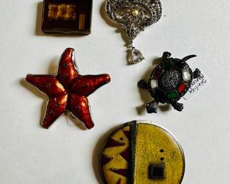 Brooches: Andrea Haffner (top L) and Panetta (top R); Priscilla Canales (center L) and Deb Karash (lower R)