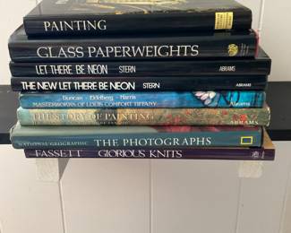 Many coffee table books, instruction books on glass cutting, painting, photography and many more.