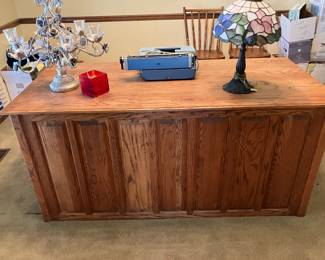 Large oak desk w/ paneled sides, leaded stained glass lamp