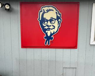 Large Collectible Colonel Sanders Kentucky Fried Chicken Sign hanging on outside wall