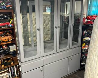 Awesome 4 Door Mirrored Display Case for your Collection with Glass Shelving, Mirrored Backing, Lighted and with Plenty of Cabinet Storage below.