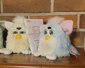 Furbys with tags and instructions manuals