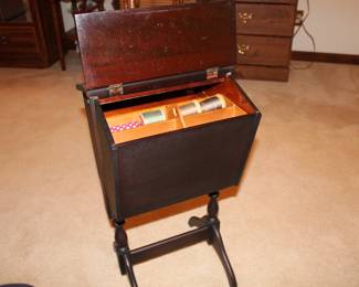 Vintage standing sewing box with insert and vintage wooden spooled thread. 