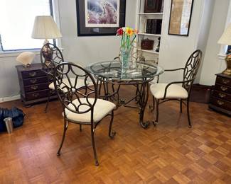 42" glass top table with matching chairs