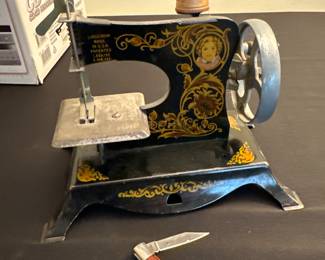 Lindstrom toy sewing machine, Winchester pocket knife