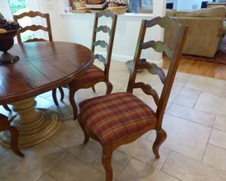 Round pedestal dining table with 5 chairs