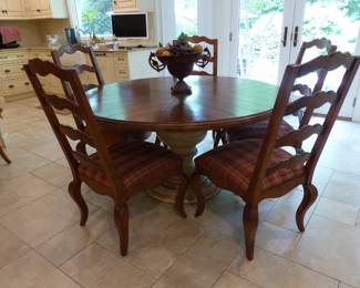 Round pedestal dining table with 5 chairs