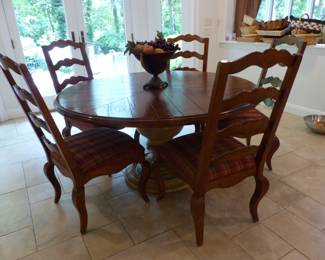 Round pedestal dining table with 5 chairs