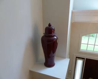 Pair of tall covered vases